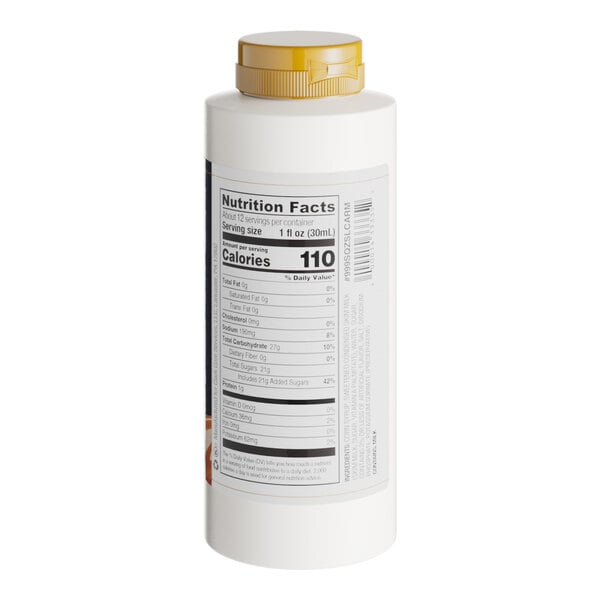 A white Capora bottle of salted caramel flavoring sauce with a yellow label.