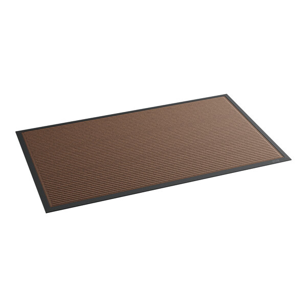 A brown rectangular rug with black border.