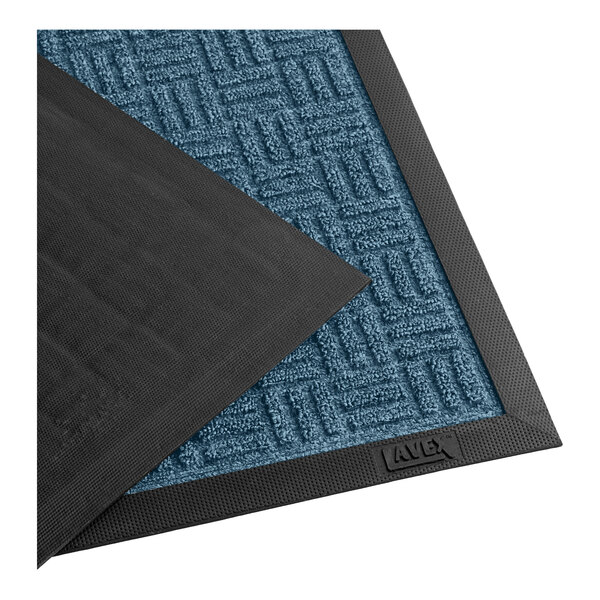 A close-up of a blue and black Lavex parquet entrance mat.