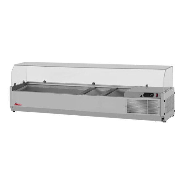 A Turbo Air stainless steel refrigerated countertop salad prep table with a clear hood.