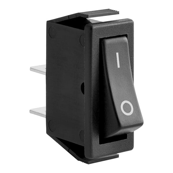 A black switch with white text for a Cooking Performance Group rotisserie oven.