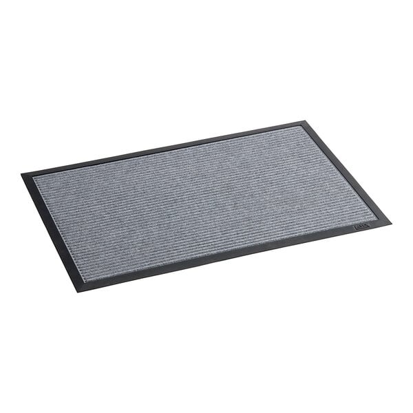 A grey rectangular mat with black border.