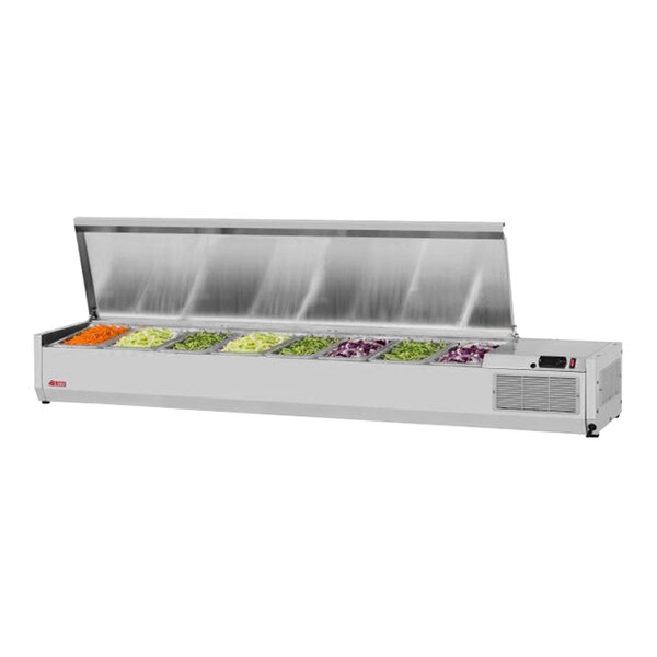 A white rectangular Turbo Air refrigerated countertop salad prep table with food in food containers.