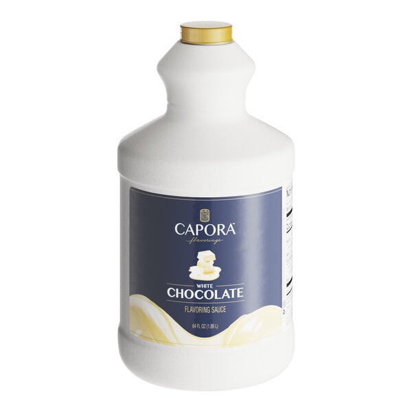 A white bottle of Capora White Chocolate Flavoring Sauce with a blue label.