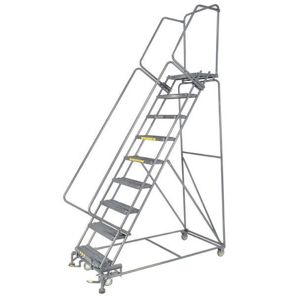 A Ballymore gray steel rolling ladder with expanded metal steps and wheels.