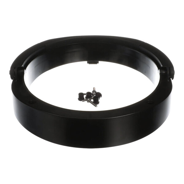 A black circular top cover for a Bunn coffee maker with screws.