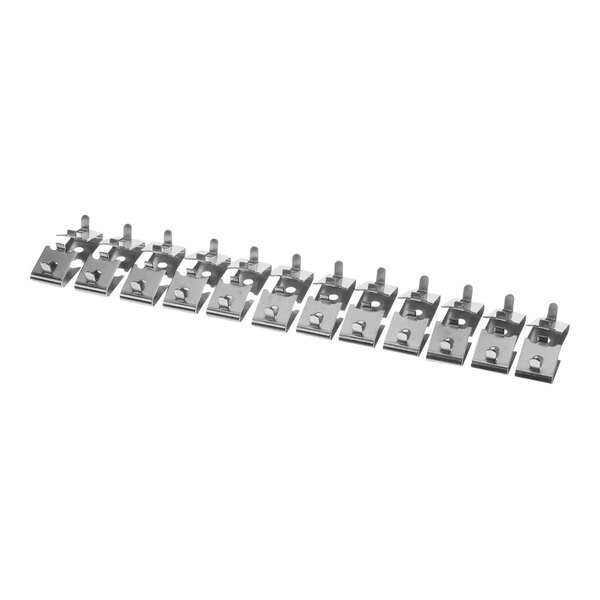 A row of metal True Refrigeration shelf clips.