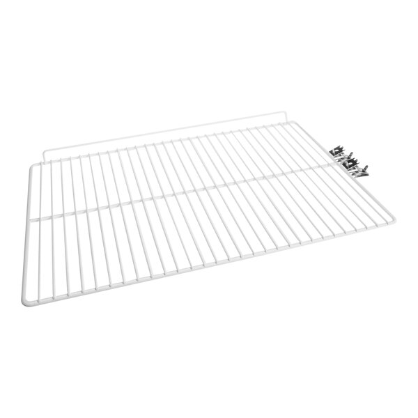 A powder coated white wire shelf for a Traulsen refrigerator on a white background.