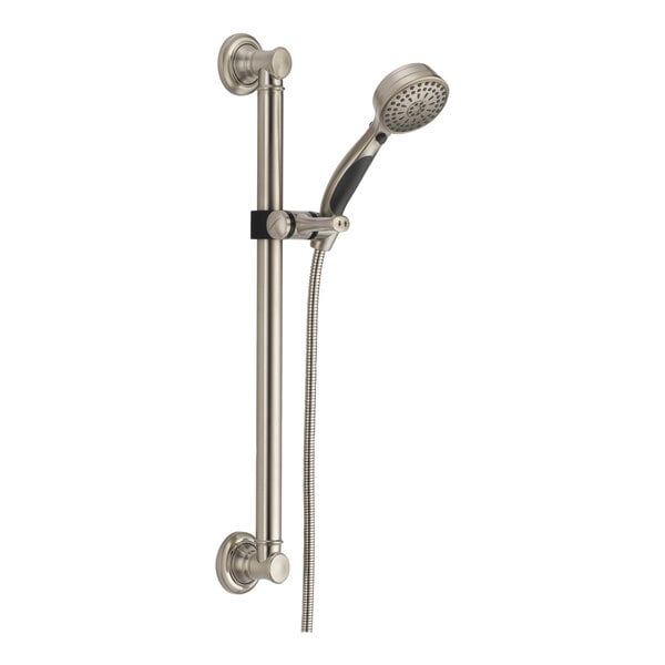 A Delta stainless steel handheld shower head with a hose.