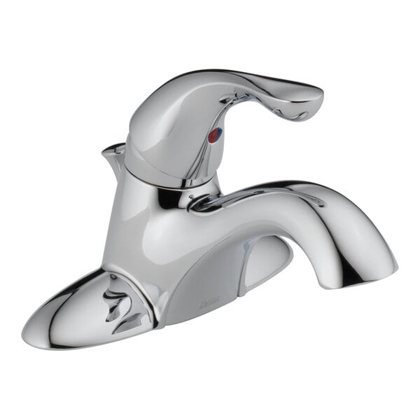 A silver Delta deck-mount faucet with a curved handle.