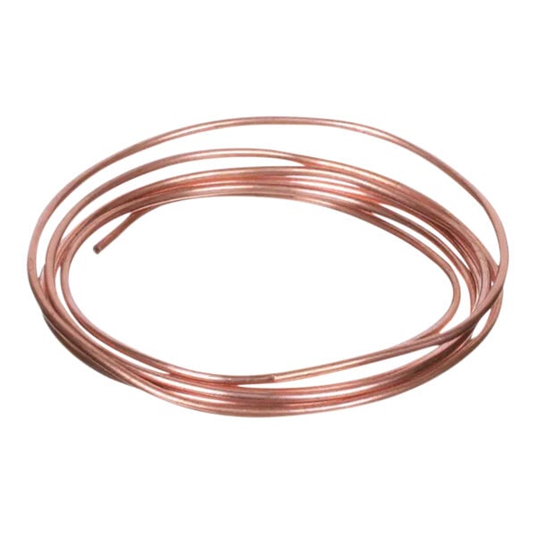 A close-up of a copper cap tube with a label.