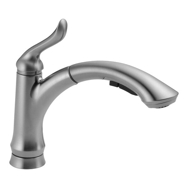 A silver Delta deck-mount kitchen faucet with a curved handle and pull-out spray wand.