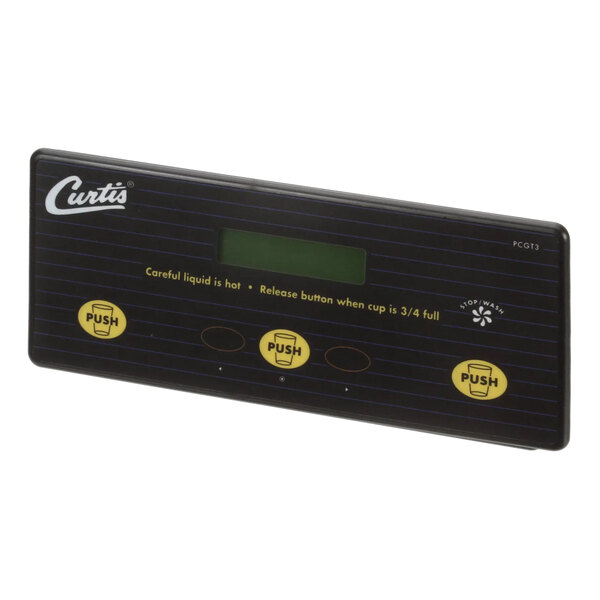 A black rectangular Wilbur Curtis UCM board with yellow buttons and a display.