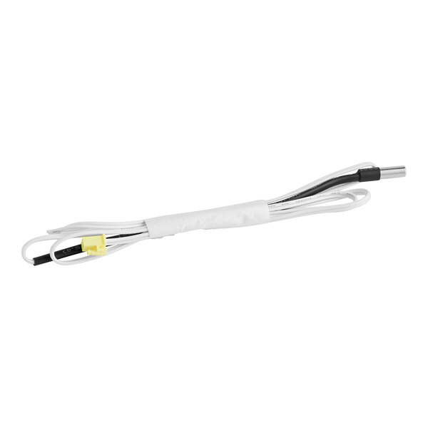 A close-up of a white cable with a yellow wire attached to it.