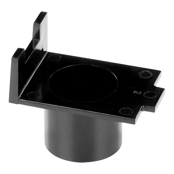 A black rectangular plastic adapter with a black circular hole.