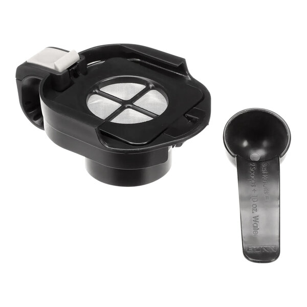 A black plastic Bunn coffee adapter with a black plastic spoon.