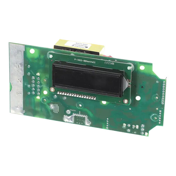 A green circuit board with a black rectangular object.