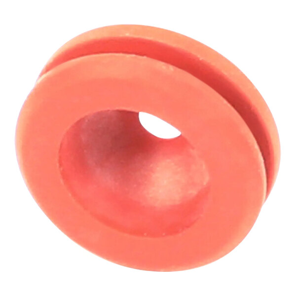 A close-up of a red silicone gasket with a hole in it.