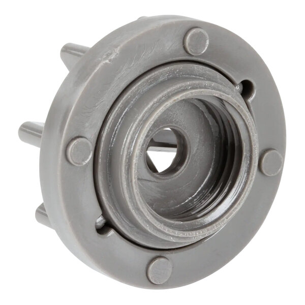 A grey metal object with a hole.
