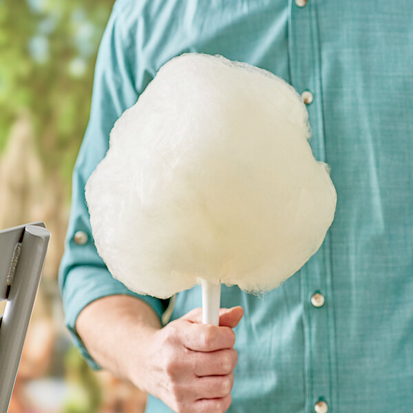 A person holding a Great Western Pina Colada cotton candy