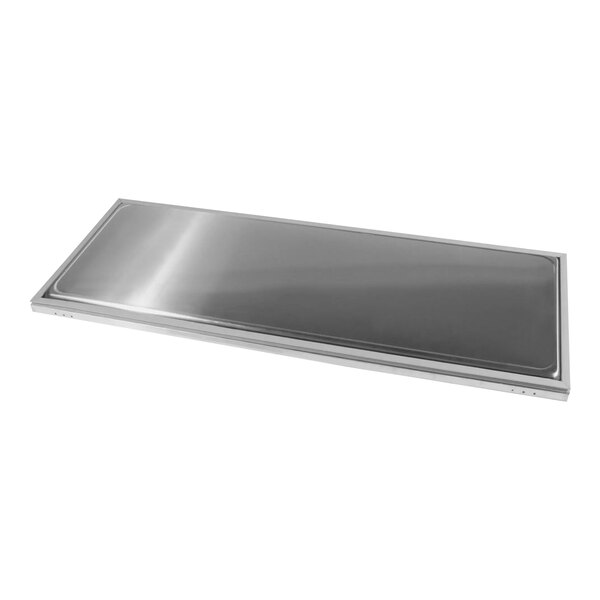 A stainless steel Traulsen door assembly on a counter.