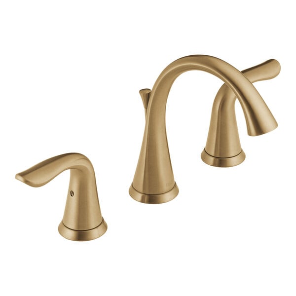 A close-up of a Delta champagne bronze Lahara widespread deck-mount faucet with lever handles.
