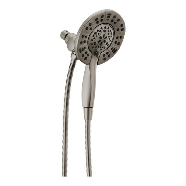 A Delta stainless steel shower head with a hand held shower head on a hose.