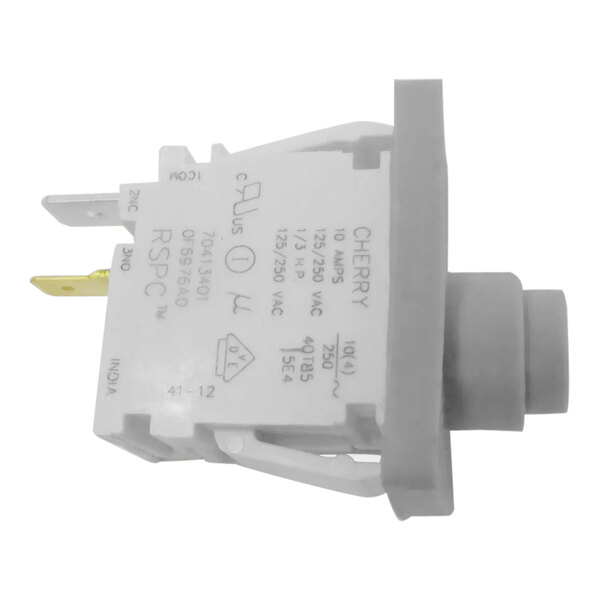 A white electrical device with a yellow connector.