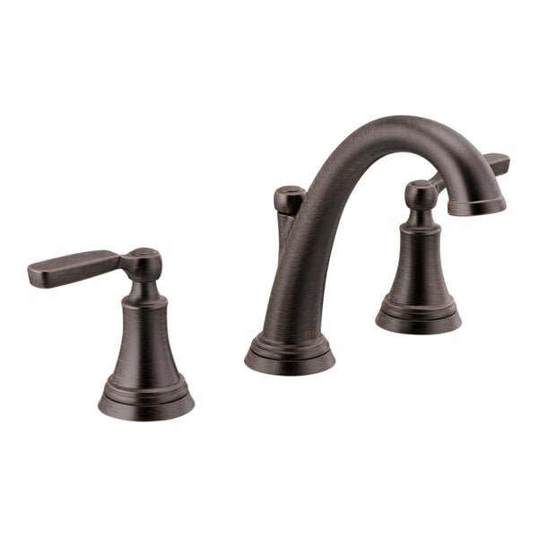 Two Delta Woodhurst widespread deck-mount faucets with lever handles in a dark bronze finish.