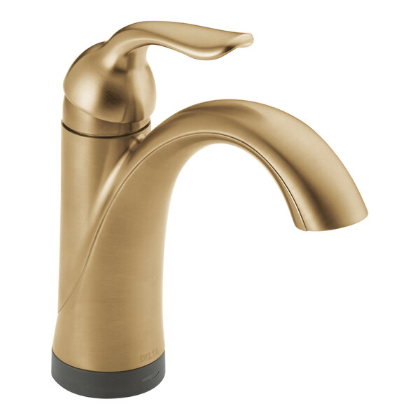 A Delta champagne bronze deck-mount faucet with a curved handle.
