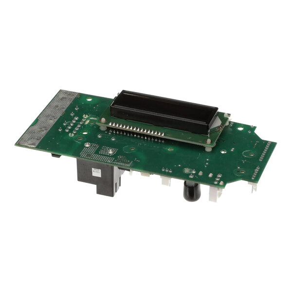 The green circuit board of a Bunn 42533.7101 CBA with a black rectangular object.