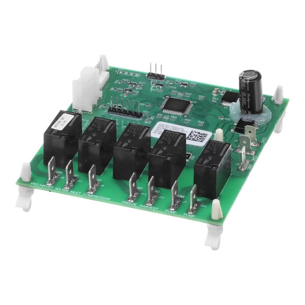 A green Scotsman control board with black and white components