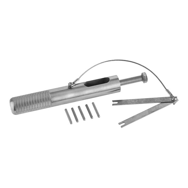 A metal tool with a screwdriver and several small metal objects.