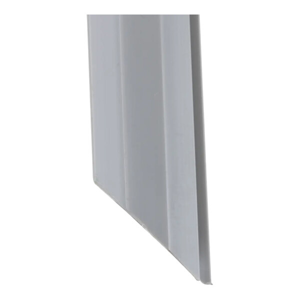 A close-up of a white plastic corner piece with a grey edge.
