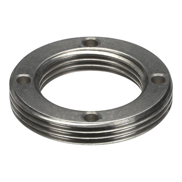 A close-up of a Fetco metal locknut with two holes.