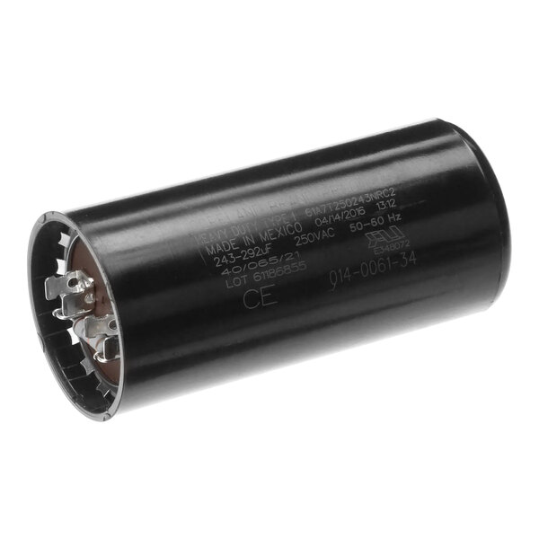 A black cylindrical Traulsen capacitor.