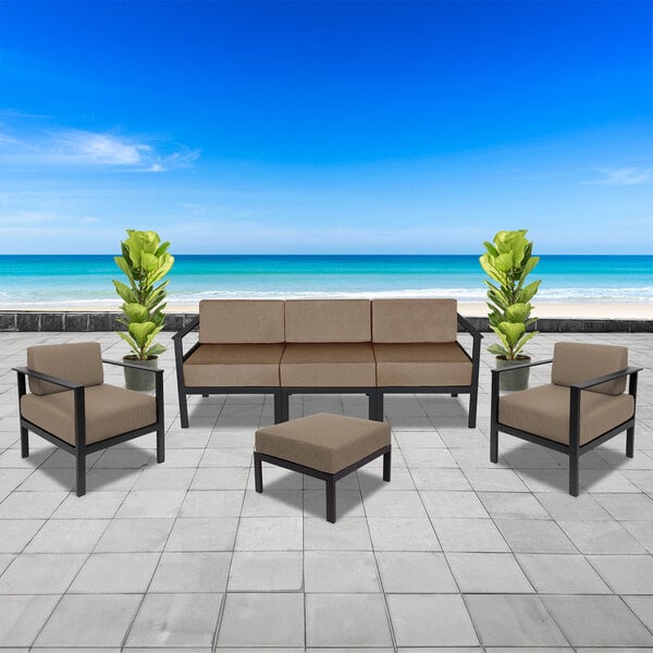 A BFM Seating Belmar armless middle sofa section with a Sunbrella Flint brown cushion on a black frame.