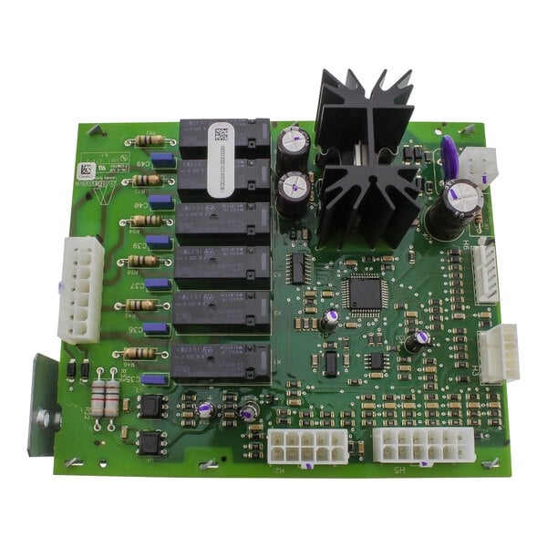 A green Alliance Laundry hybrid control circuit board with many small black and white components.