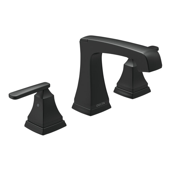 A close-up of a Delta Ashlyn widespread lavatory faucet with black lever handles and metal pop-up drain.