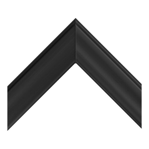 A close-up view of a black, angled frame or trim piece with a smooth, matte finish.
