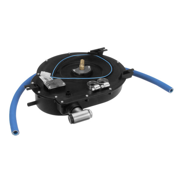 A black circular device with blue tubes and a silver hose.