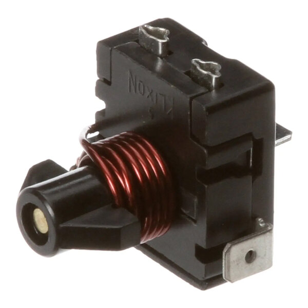 A close-up of a Traulsen start relay coil with black and red wires.