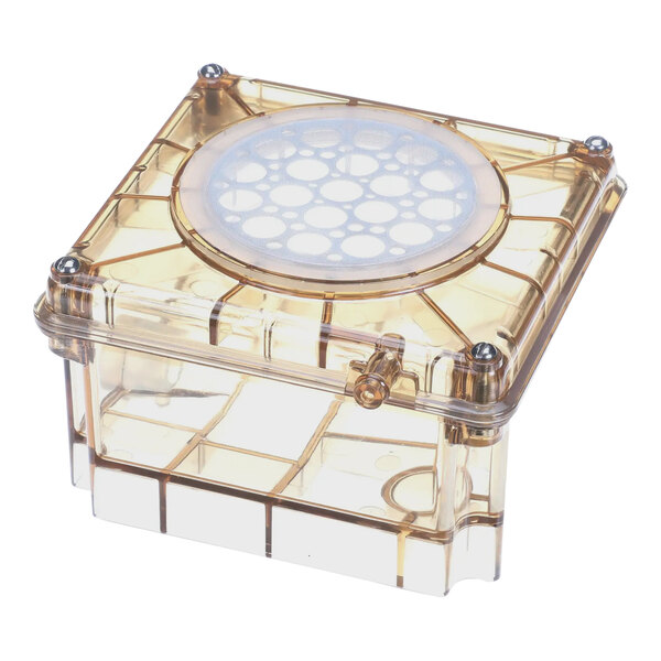 A clear plastic box with a round lid containing a circular filter.