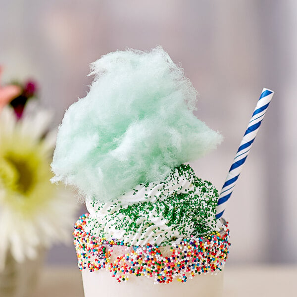 A cup with Great Western lime cotton candy floss and a straw.