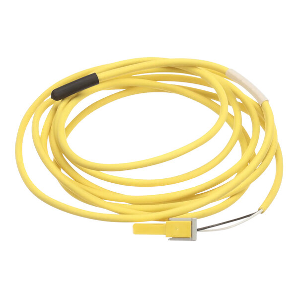 A yellow cable with a black connector on a Traulsen liquid line sensor.