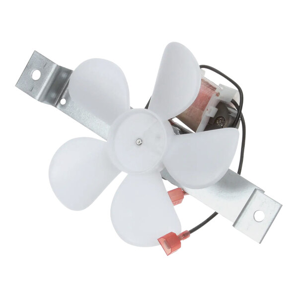 A close up of a white Traulsen Phantom fan motor with a metal bracket and wires.