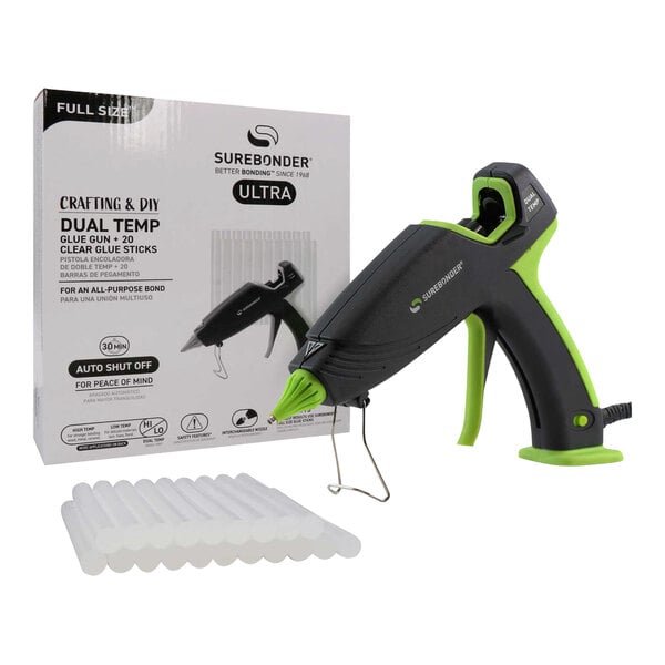 A black and green Surebonder dual temperature hot glue gun in a box with 20 glue sticks.