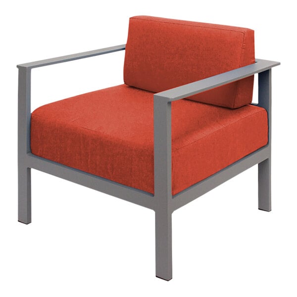 A BFM Seating Belmar armchair with a gray metal frame and orange Sunbrella cushion.