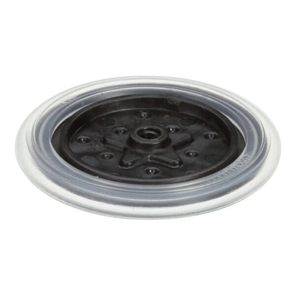 A black and clear plastic circular object with a star in the middle.