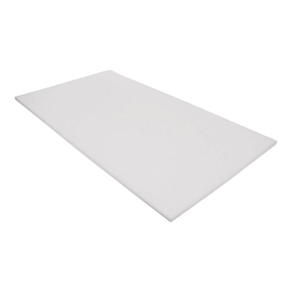 A white rectangular Traulsen plastic cutting board.